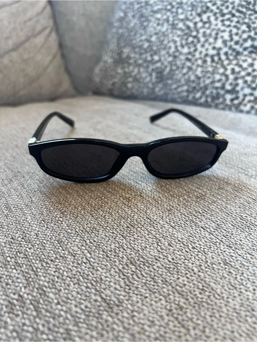 Miu Miu Black Sunglasses with Gold Accent - Classic Cat-Eye Style